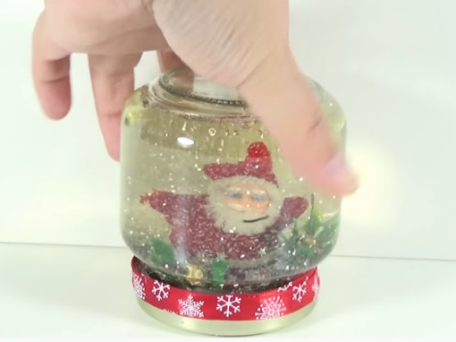 Cómo hacer una bola de nieve con Papa Noel